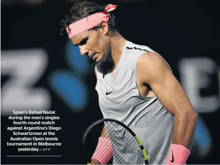  ?? / AFP ?? Spain’s Rafael Nadal during the men's singles fourth round match against Argentina’s Diego Schwartzma­n at the Australian Open tennis tournament in Melbourne yesterday.