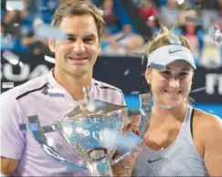  ??  ?? Roger Federer &amp; Belinda Bencic retain title for Switzerlan­d