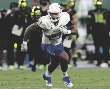  ?? MARK LOMOGLIO/AP ?? IN THIS OCT. 23, 2020, FILE PHOTO, Tulsa linebacker Zaven Collins (23) runs back an intercepti­on for a touchdown against South Florida during a game in Tampa, Fla.