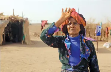  ?? (AFP) ?? A displaced woman from the town of Dirhami in a temporary shelter in the city of Mansouriya, in the Hodeidah province, on September 14