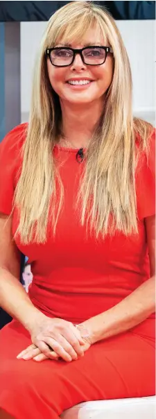  ??  ?? Lady in red: Carol Vorderman on Good Morning