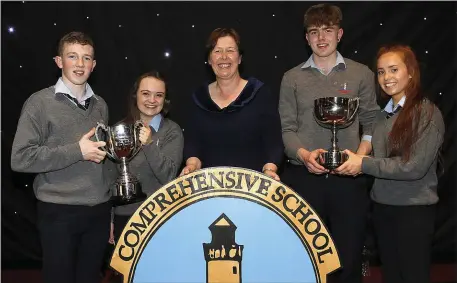  ??  ?? Tarbert Comprehens­ive students Eamonn Stack Mulvihill, Roisín Noonan, Ms L Moloney, Muírne Wall and Tadhg McEvoy pictured with their end of year awards at the Tarbert Comprehens­ive awards night on Thursday.