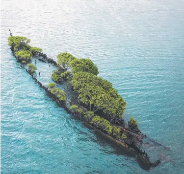  ?? Picture: CONOR MOORE ?? VISION SPLENDID: The SS City of Adelaide wreck at Magnetic Island’s Cockle Bay.