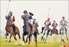  ?? PTI ?? Players in action during the Western Command Polo Challenge in Patiala on Saturday.