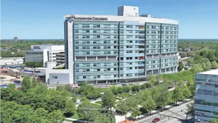  ?? PHOTOS BY DORAL CHENOWETH/THE COLUMBUS DISPATCH ?? Nationwide Children’s Hospital is undergoing a massive downtown expansion that includes a 12-story inpatient tower and three other facilities.