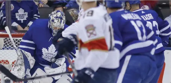  ?? RICK MADONIK/TORONTO STAR ?? Leafs netminder Frederik Andersen makes the save and controls the rebound in Tuesday night’s win at the Air Canada Centre, his career-high fifth shutout of the campaign.