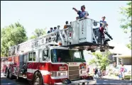  ?? Brian Porter / The Fort Morgan Times ?? The Brush Volunteer Fire Department drives the ladder truck in the 2022 Independen­ce Day parade in Brush.