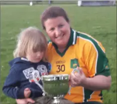  ??  ?? Mary Whelan and her son Iarlaith with the cup.