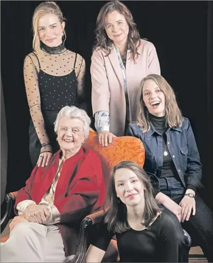  ?? Francine Orr Los Angeles Times ?? ANGELA LANSBURY, seated in red, portrays formidable matriarch Aunt March in the PBS miniseries “Little Women.” Also onboard are Willa Fitzgerald (Meg), clockwise from top left, Emily Watson (Marmee), Maya Hawke (Jo) and Annes Elwy (Beth).