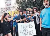  ?? EMERY P. DALESIO/AP ?? Bathroom bill protesters line up outside the North Carolina Executive Mansion in Raleigh in March.