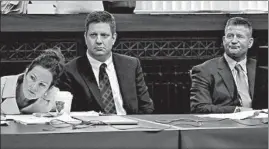  ?? /ANTONIO PEREZ/CHICAGO TRIBUNE ?? Jason Van Dyke, center, is flanked by attorneys Tammy Wendt and Daniel Herbert. Even as jury selection begins, the lawyers have yet to announce if they will request a trial by judge.