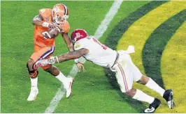  ?? GETTY IMAGES/FILE ?? Clemson quarterbac­k Deshaun Watson, left, will likely play a pivotal role in Monday’s game, but there is no telling who will emerge as a star on the big stage.