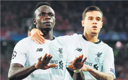  ?? Picture: Reuters ?? FIGHTBACK. Liverpool’s Sadio Mane celebrates with goalscorer Philippe Coutinho during their Champions League match against Spartak Moscow at the Otkrytiye Arena in Moscow last night.