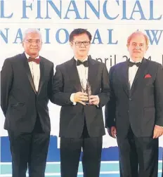  ??  ?? Lim (centre) with Paillart (right) and founder of Asian Banker Emmanuel Daniel at the Asian Banker Awards 2014 in Sydney, Australia recently.