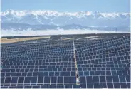  ?? Gilles Sabrie / New York Times ?? A solar energy farm near Wenquan, China, is part of a national plan to move away from fossil fuels.