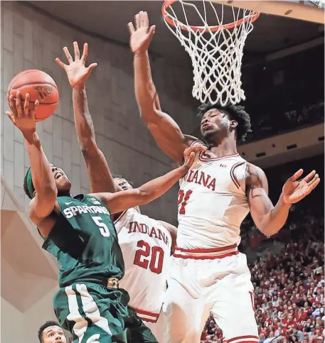  ?? BRIAN SPURLOCK, USA TODAY SPORTS ?? Indiana and Freddie McSwain, right, beat Michigan State and Cassius Winston in a matchup of bubble teams in January.