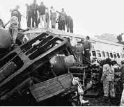  ?? PHOTO: PTI ?? Rapid action force team performs rescue operations after the Hirakhand Express derailed near Kuneru station in Vizianagar­am, Andra Pradesh, on Sunday.