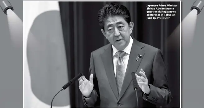  ?? Photo: AFP ?? Japanese Prime Minister Shinzo Abe answers a question during a news conference in Tokyo on June 19.