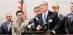  ?? File photo ?? State Sen. Kevin Kelly, center, with state Sen. Tony Hwang, second from left, and others in 2019.