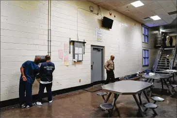  ?? ELIJAH NOUVELAGE FOR THE AJC 2019 ?? The Atlanta City Detention Center currently uses about 4% of the 471,000-square-foot, 1,300-bed jail on Peachtree Street, with a daily average intake of 24 to 30 low-level inmates. The mayor wants to close the facility, but the specific plan has generated heavy hesitancy and outright opposition.