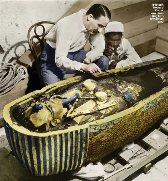  ??  ?? Ill-fated?: Howard Carter examines King Tut’s remains in 1923