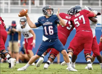  ?? ALLEN EYESTONE / THE PALM BEACH POST ?? FAU’s Jason Driskel went 10-1 as a starter this past season as a junior and posted the best numbers of his career with 2,247 yards and 15 touchdowns passing. He threw only four intercepti­ons.