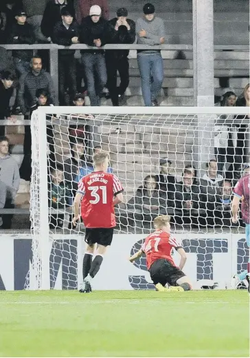  ??  ?? Scunthorpe score their third goal against Sunderland last night. Pictures by Frank Reid.