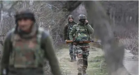  ??  ?? Security forces during an operation against insurgents in Arunachal Pradesh.