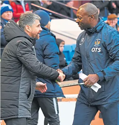  ??  ?? It was not a good festive season for Stephen Robinson or Alex Dyer