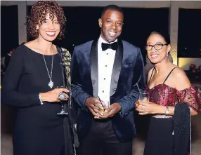  ??  ?? From left: Kelly-Anne Chin, Dr Patrice Monthrope and Aloma Lai having a good time at the recent MAJ Annual Awards and Banquet.
