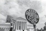  ?? JOSE LUIS MAGANA/AP ?? Demonstrat­ors protest outside of the Supreme Court on May 3.