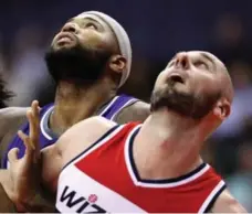  ?? ROB CARR/GETTY IMAGES ?? All-star big man DeMarcus Cousins, left, says he was happy in Sacramento, but frustrated by the Kings’ lack of success on the court.