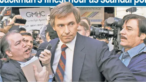  ??  ?? NO COMMENT: Hugh Jackman is in no mood to meet the press as real-life tainted presidenti­al hopeful Gary Hart in “The Front Runner.”