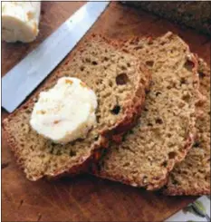  ?? ELIZABETH KARMEL VIA AP ?? This photo shows wheaten bread with sweet scotch whiskey butter in Amagansett, NY. This dish is from a recipe by Elizabeth Karmel.