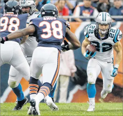  ?? AP PHOTO ?? In an Oct. 22 file photo, Carolina Panthers running back Christian Mccaffrey rushes during the second half of an NFL game against the Chicago Bears in Chicago.