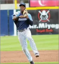  ?? GREGG SLABODA — TRENTONIAN PHOTO ?? The Thunder’s Jorge Mateo throws to first base against Hartford on Wednesday.