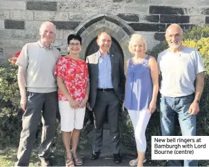  ??  ?? New bell ringers at Bamburgh with Lord Bourne (centre)