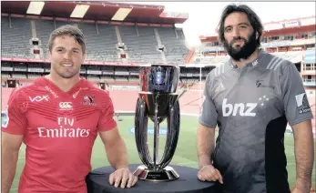  ?? PICTURE: BACKPAGEPI­X ?? DETERMINED TO GET THEIR HANDS ON IT: Lions captain Jaco Kriel and Crusaders skipper Sam Whitelock with the Super Rugby trophy at Ellis Park yesterday ahead of this evening’s final.