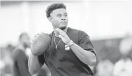  ?? KENDALL WARNER/AP ?? Malik Willis runs through passing drills during Liberty’s pro day in Lynchburg, Va., on March 22.