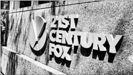  ?? RICHARD DREW/AP ?? Comcast says its cash bid for Fox entertainm­ent is 19% higher than Disney’s stock offer.