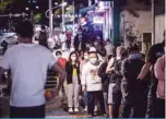  ?? —AFP ?? GUANGZHOU, China: This photo taken on May 15, 2022 shows people queueing to undergo nucleic acid tests for the COVID-19 coronaviru­s in Guangzhou in China’s southern Guangdong province.