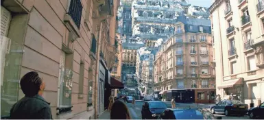  ?? WARNER BROS. PICTURES PHOTOS ?? The streets of Paris are folded on top of one another in one of the most memorable scenes in “Inception.”