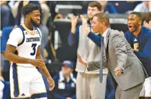  ?? STAFF FILE PHOTO BY ROBIN RUDD ?? The UTC’s men’s basketball team, including David Jean-Baptiste (3), went 10-23 in 2017-18, its first season under Lamont Paris, right. Paris was the Mocs’ fourth head coach in six seasons, and having him stick around for a while would bring needed...