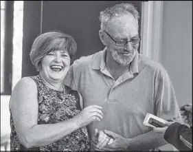  ?? RYAN TAPLIN/SALTWIRE NETWORK ?? Marlene and Reggie Mackinnon have a laugh as they’re interviewe­d inside their new home in the Indigo Shores at Mccabe Lake subdivisio­n in Middle Sackville on Thursday. The Mackinnons bought the grand prize-winning ticket in this year’s QE2 Home...