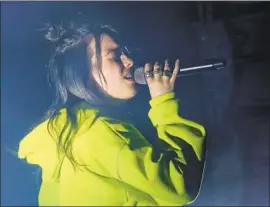 ?? Jack Plunkett Invision / Associated Press ?? SINGER Billie Eilish at South by Southwest Music Festival last month in Texas.