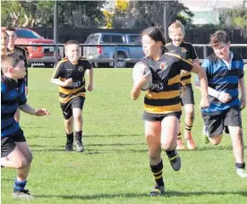  ??  ?? Action from junior rugby at Foxton at the weekend.