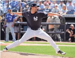  ??  ?? Yankees starting pitcher Gerrit Cole throws against the Blue Jays during a spring training game March 10 in Tampa, Fla.