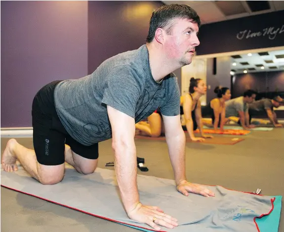  ?? JENELLE SCHNEIDER/PNG FILES ?? Paul McCallum, shown doing hot yoga last year, will be kicking for the Lions on Saturday and in the playoffs.