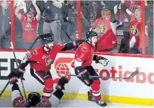  ?? SEAN KILPATRICK/THE CANADIAN PRESS ?? Ottawa Senators centre Kyle Turris (7) celebrates his game winning goal against the New York Rangers with teammates Fredrik Claesson (33) and Tom Pyatt (10) during in Game 5 on Saturday.
