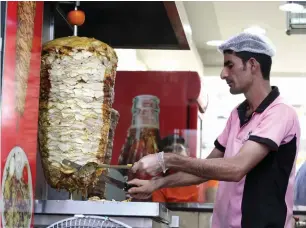  ?? File photo ?? Mandatory requiremen­ts for the handling of shawarmas ensures food safety in Dubai. —